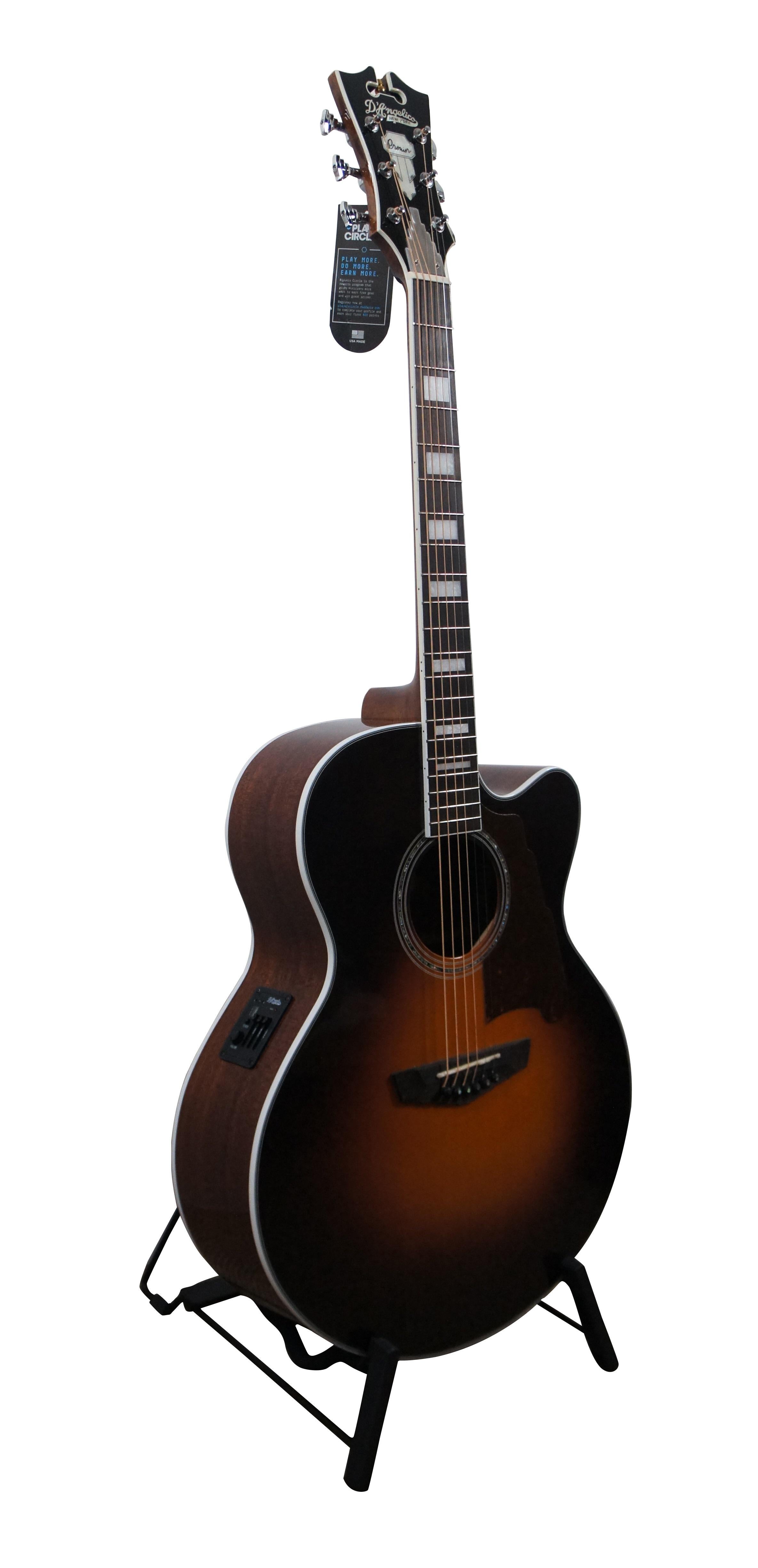 Vintage 2018 D’Angelico New York Premier Madison acoustic / electric guitar. Features: Vintage Sunburst coloring, chrome hardware, mother of pearl accents, Rotomatic Stairstep machine head, D'Addario EXP-16 (12-53) strings, ovangkol fingerboard with