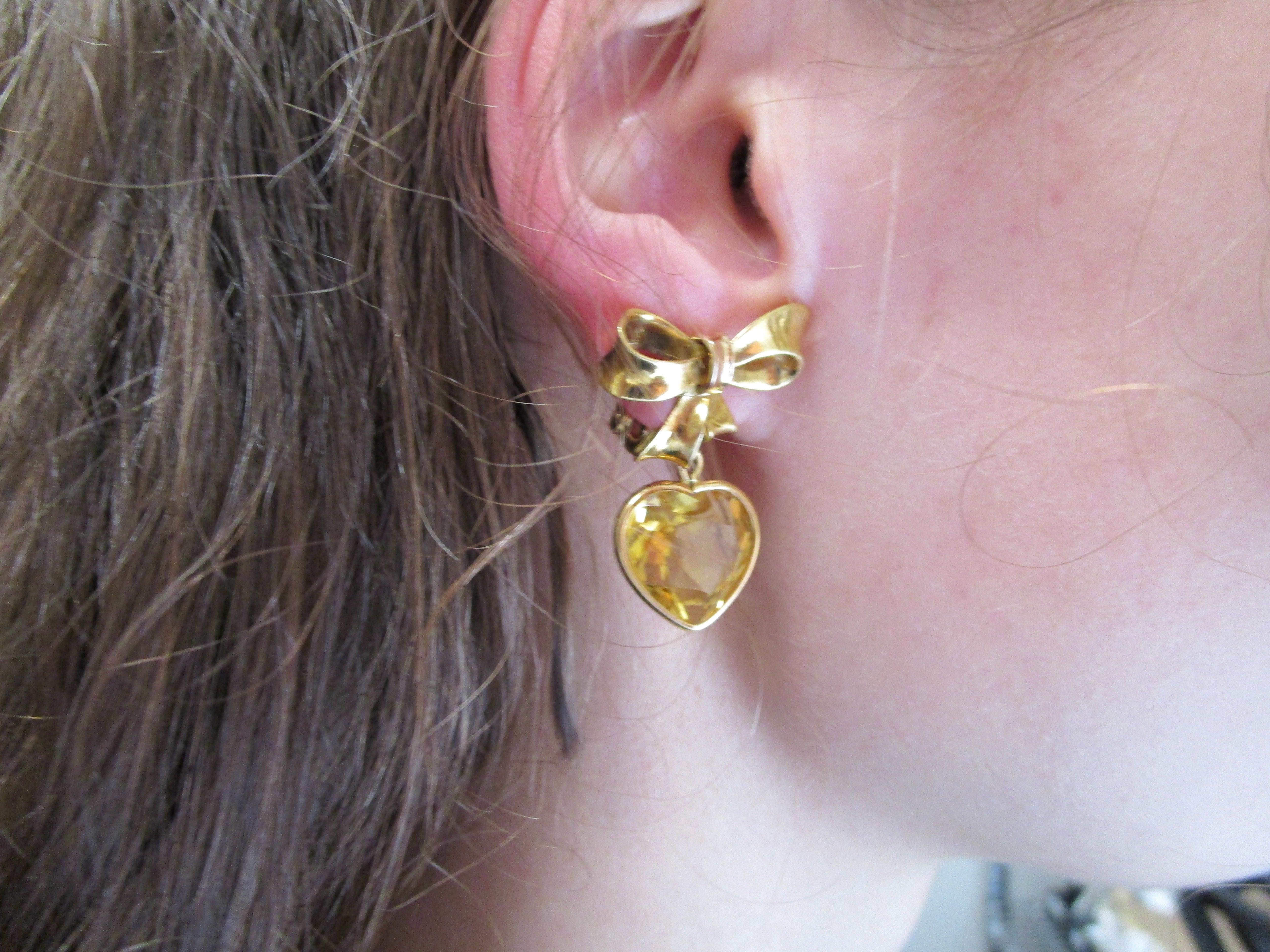 dangling gold heart earrings