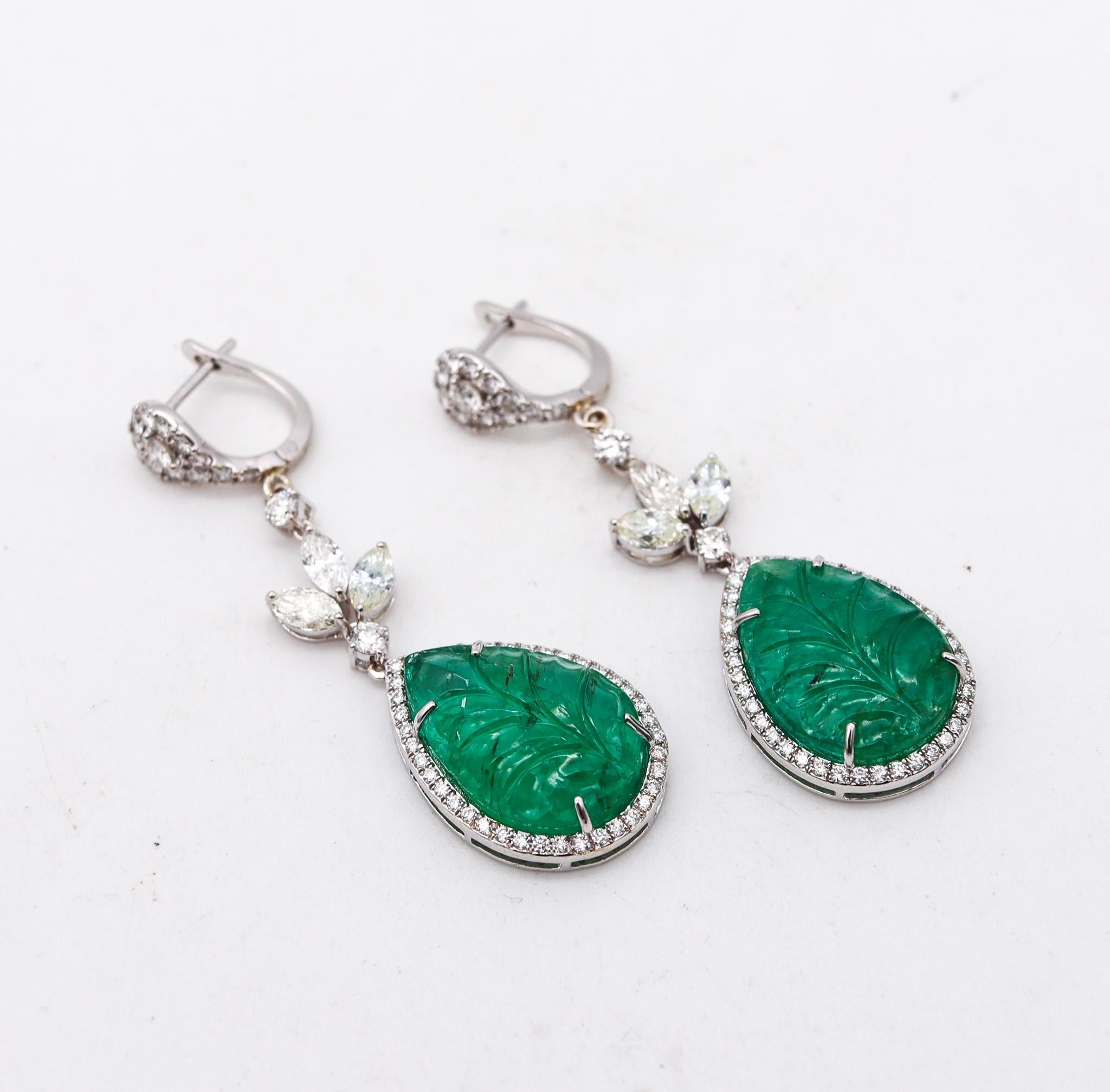 Modernist Dangle Drop Earrings In 18Kt Gold With 20.68 Ctw In Diamonds And Carved Emeralds For Sale