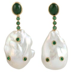 Dangle Earring with Baroque Pearl Embellished with Green Emerald in 18k Gold