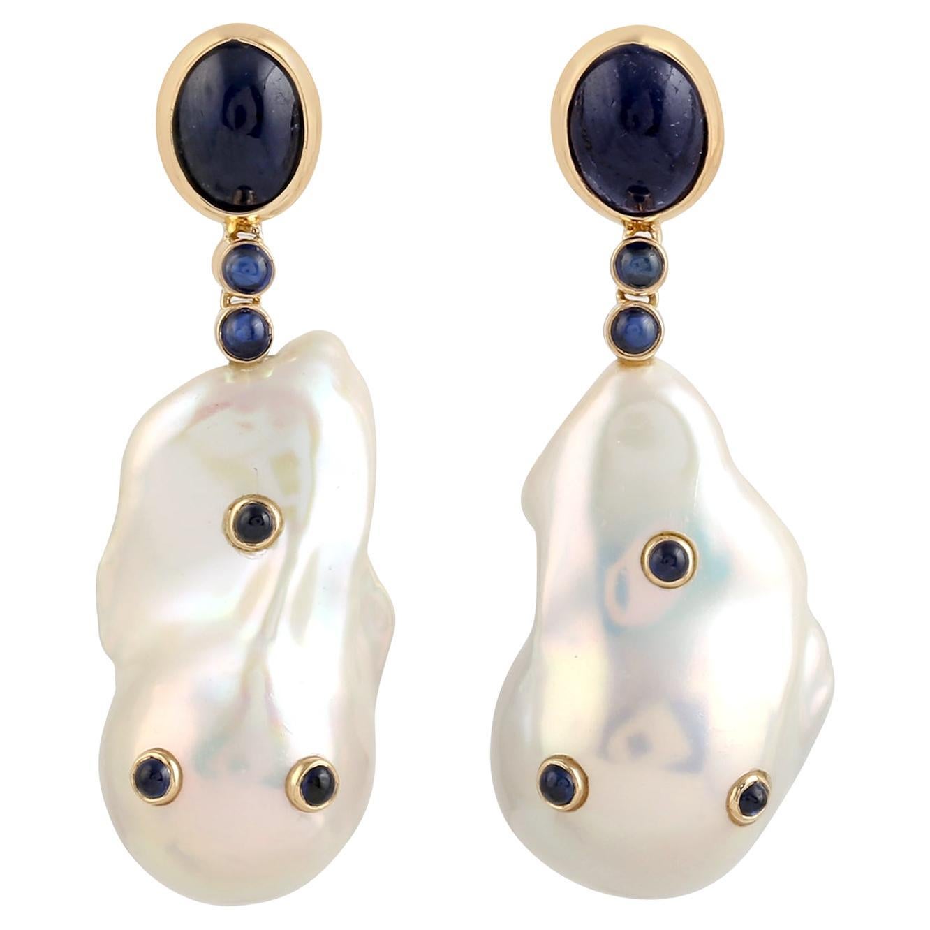 Dangle Earring with Baroque Pearl  embellished with blue sapphire In 18k Gold