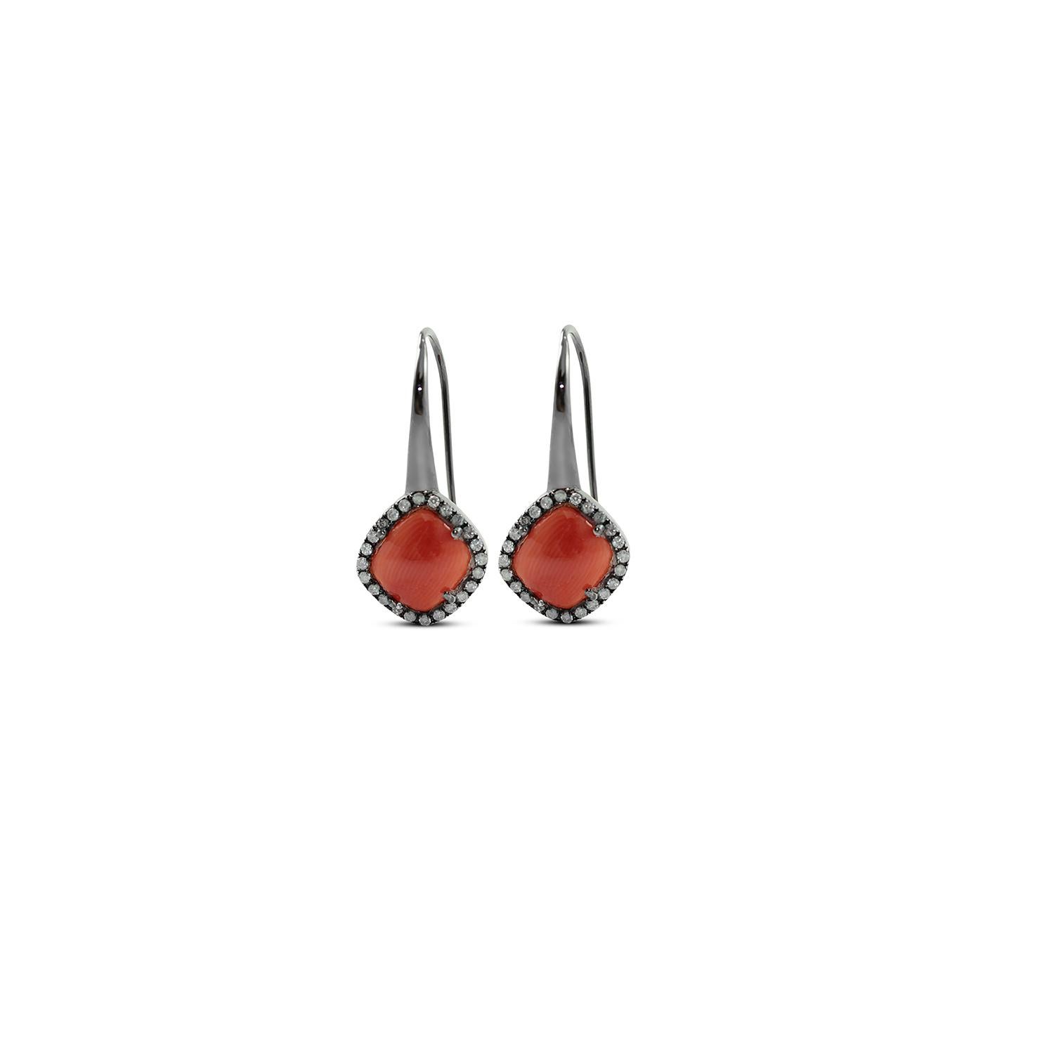 Nice earrings in 18kt black gold, ice diamonds and coral cabochons. 
Gold g. 3,84
Ice diamonds ct. 0,38
Mediterranean Coral (Corallium rubrum) 