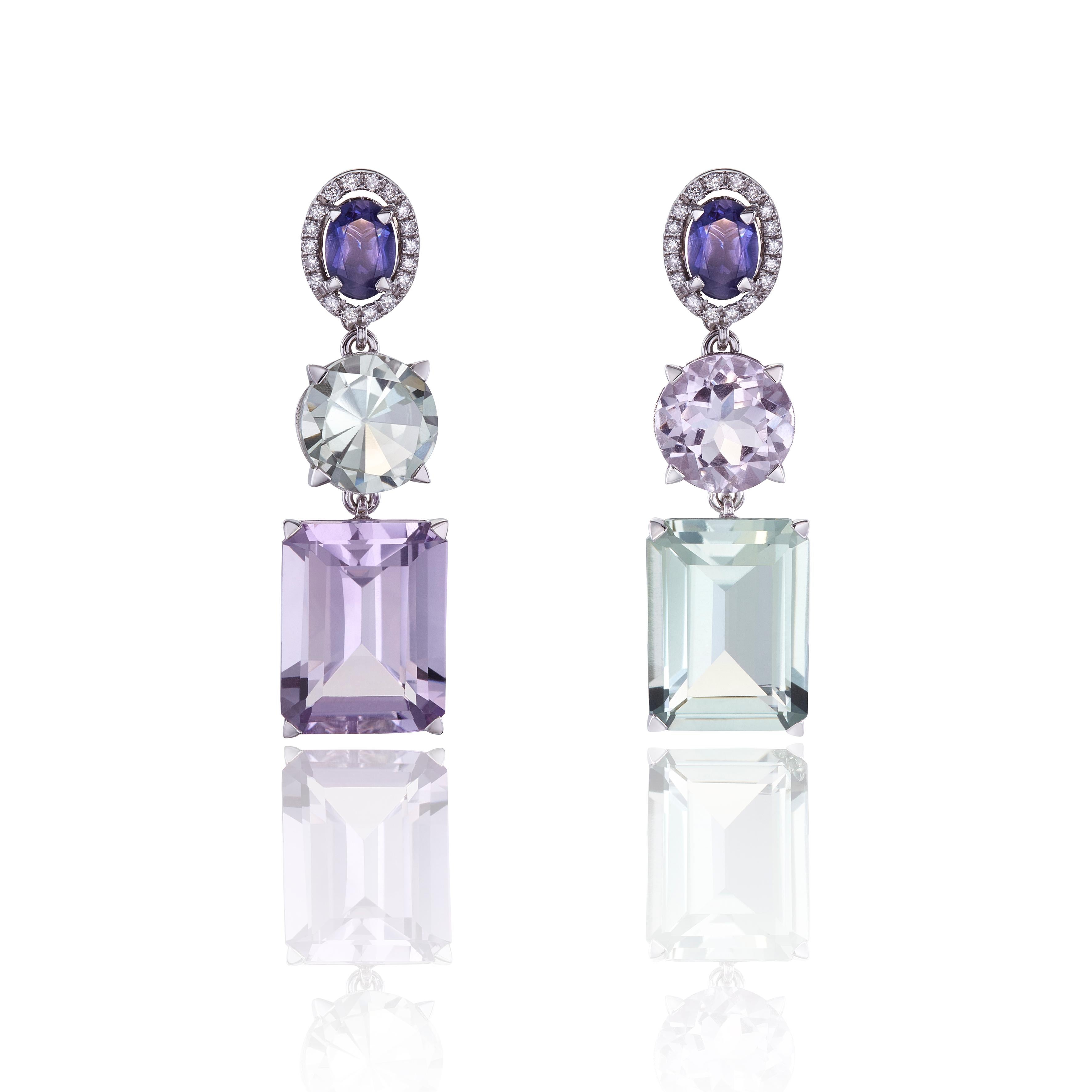 Orecchini pendenti in oro bianco 18kt, con ametista verde e viola, iolite di colore Peri e splendidi diamanti che li circondano.
Una creazione che aggiungerà stile al tuo aspetto con un'insolita combinazione di colori. Gli orecchini pendenti 