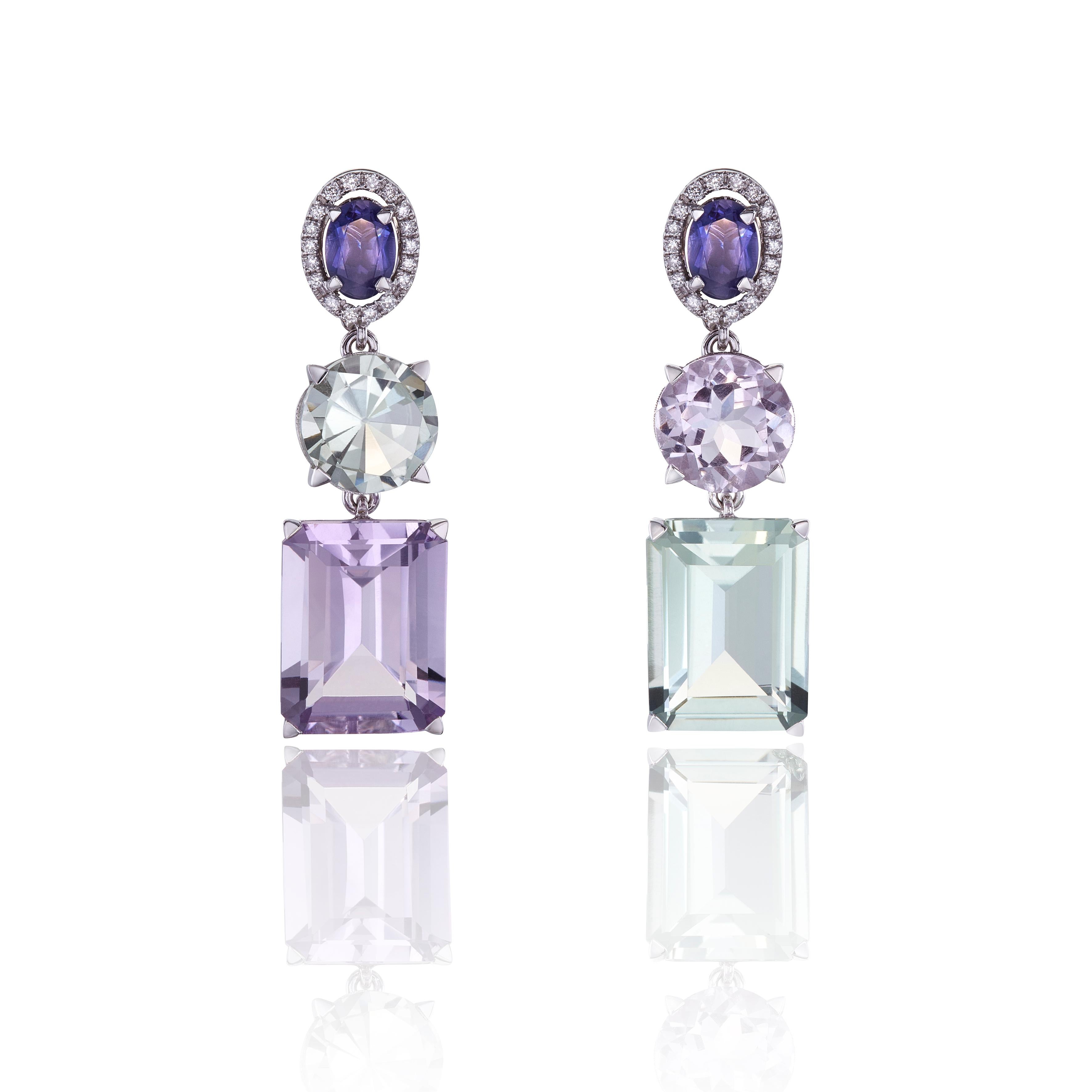 Dangle Earrings in 18kt White Gold, with Green and Purple Amethyst, Very Peri colour Iolite and beautiful diamonds surround them.
A creation that would add style to your appearance with a unusial colour cpmponation. 