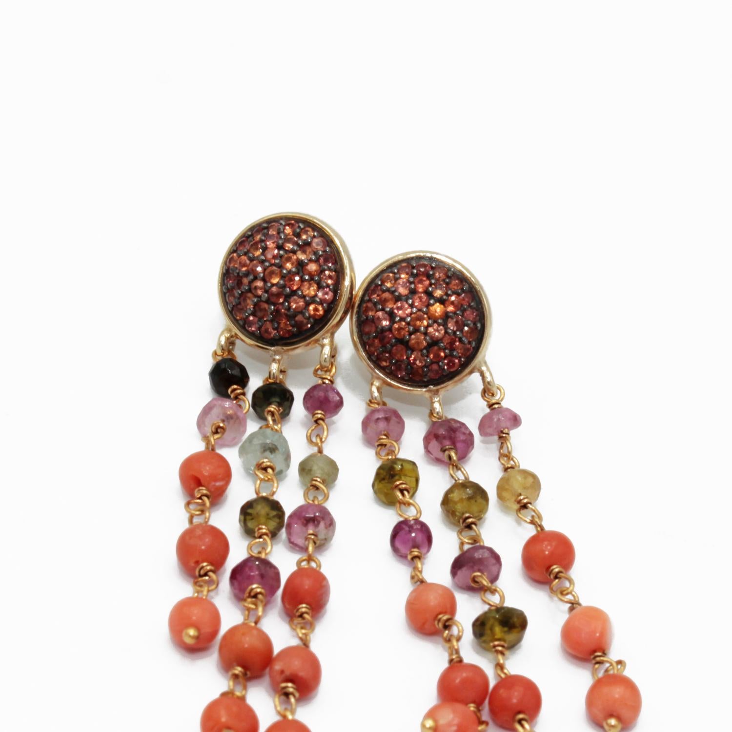 Nice Earrings made up of two paves in Orange Sapphires , small beads in Sciacca Coral and  multicolour Tourmalines and Silver.  Pierce and post system. 
925 silver g. 3
Stones ct. 21
Sciacca Coral beads ( Corallium Rubrum) 

