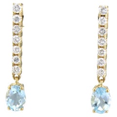 Pendientes colgantes con topacio azul y diamantes talla brillante de hasta 0,58 ct Oro de 18k