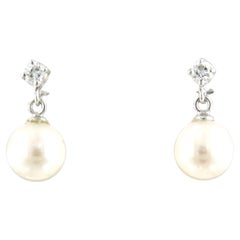 Orecchini pendenti con perla e diamanti taglio brillante fino a 0,12ct in oro 18k
