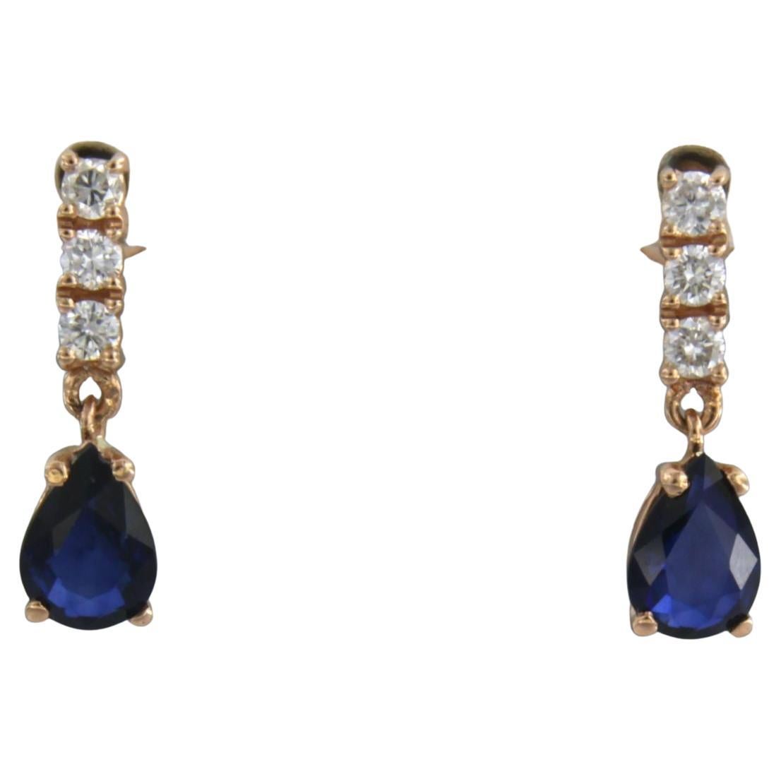 Dangle earrings with sapphire and brilliant cut diamonds up to 0.26ct 18k gold