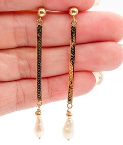 Orecchini pendenti con perle d'acqua dolce in oro giallo 14k