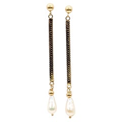Pendientes colgantes con perlas de agua dulce en oro amarillo de 14k