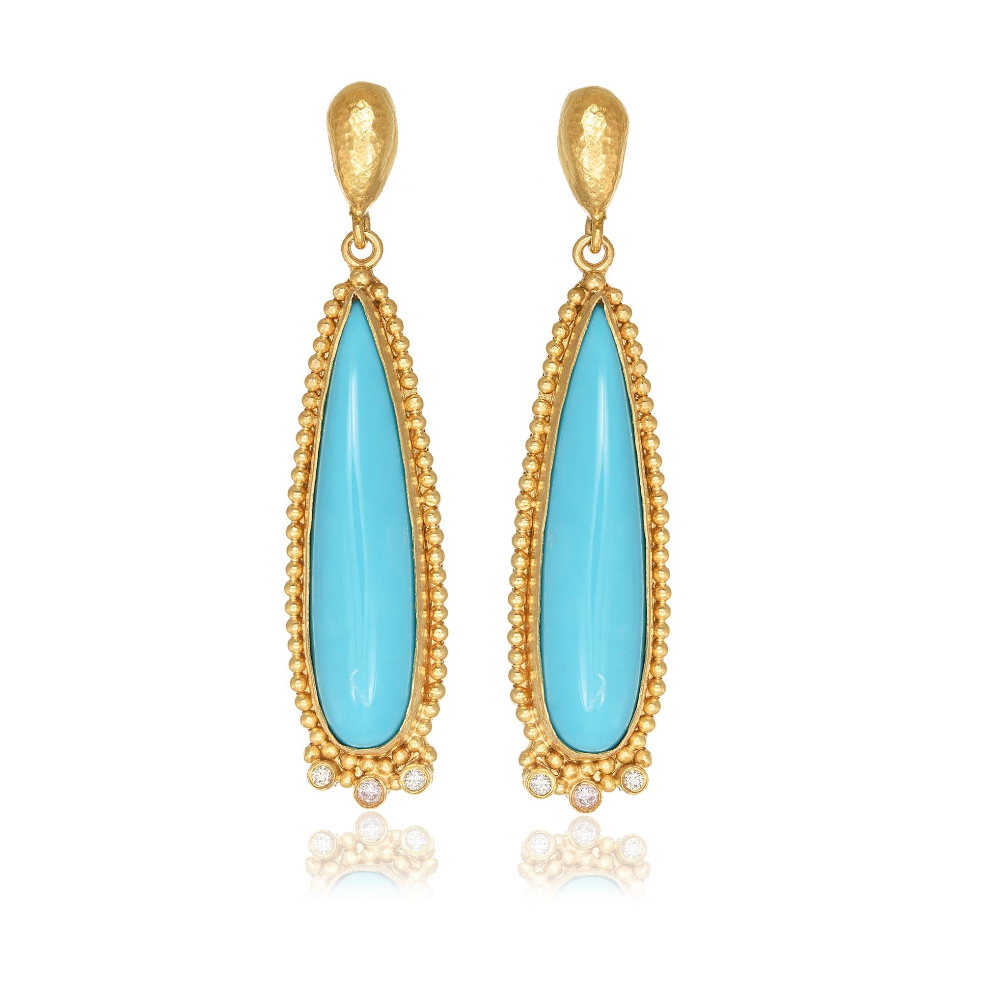 Long dangle earrings with a big pear Turquoise and three brilliant cut Diamonds, handcrafted in 22Kt yellow gold. This pair of earrings is braided accordint to the traditional techniques of hand hammering and granulation. The play of light and shade