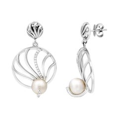 Exklusive Ohrringe aus Weißgold mit Perlen und Diamanten für sie