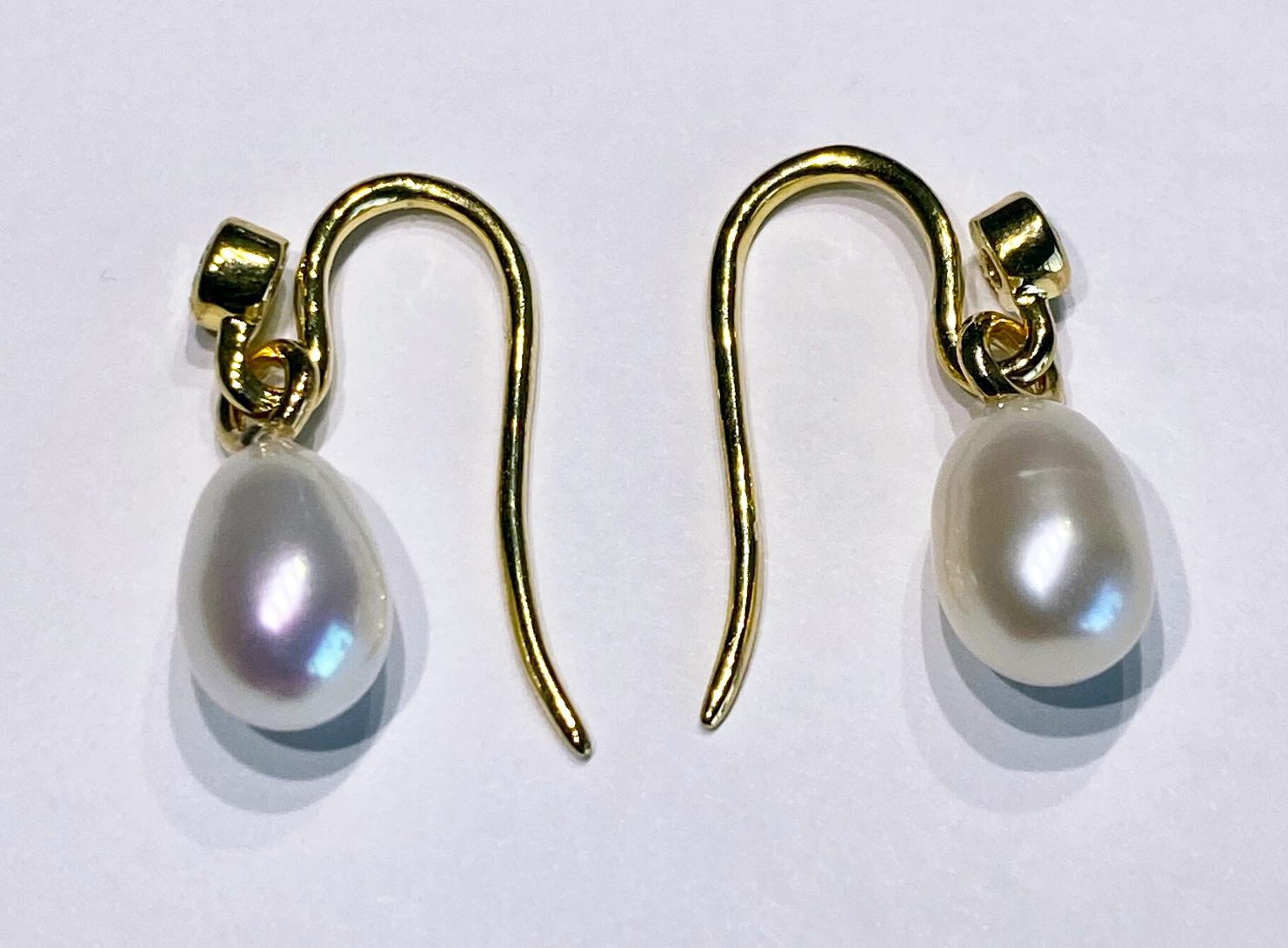 A Pair of Pearl Dangle Earrings Accented with Tanzanites. For Sale 4