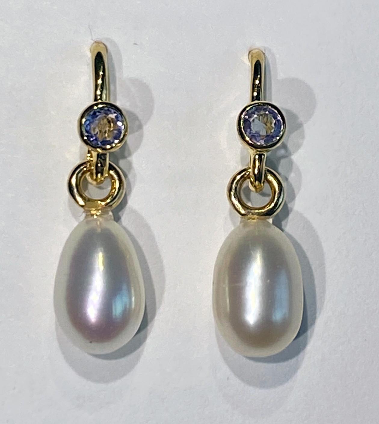 Round Cut A Pair of Pearl Dangle Earrings Accented with Tanzanites. For Sale
