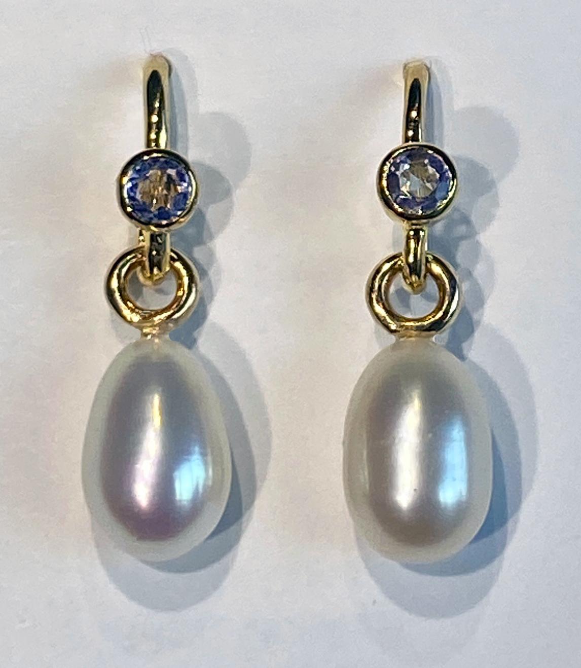 A Pair of Pearl Dangle Earrings Accented with Tanzanites. In New Condition For Sale In Seattle, WA