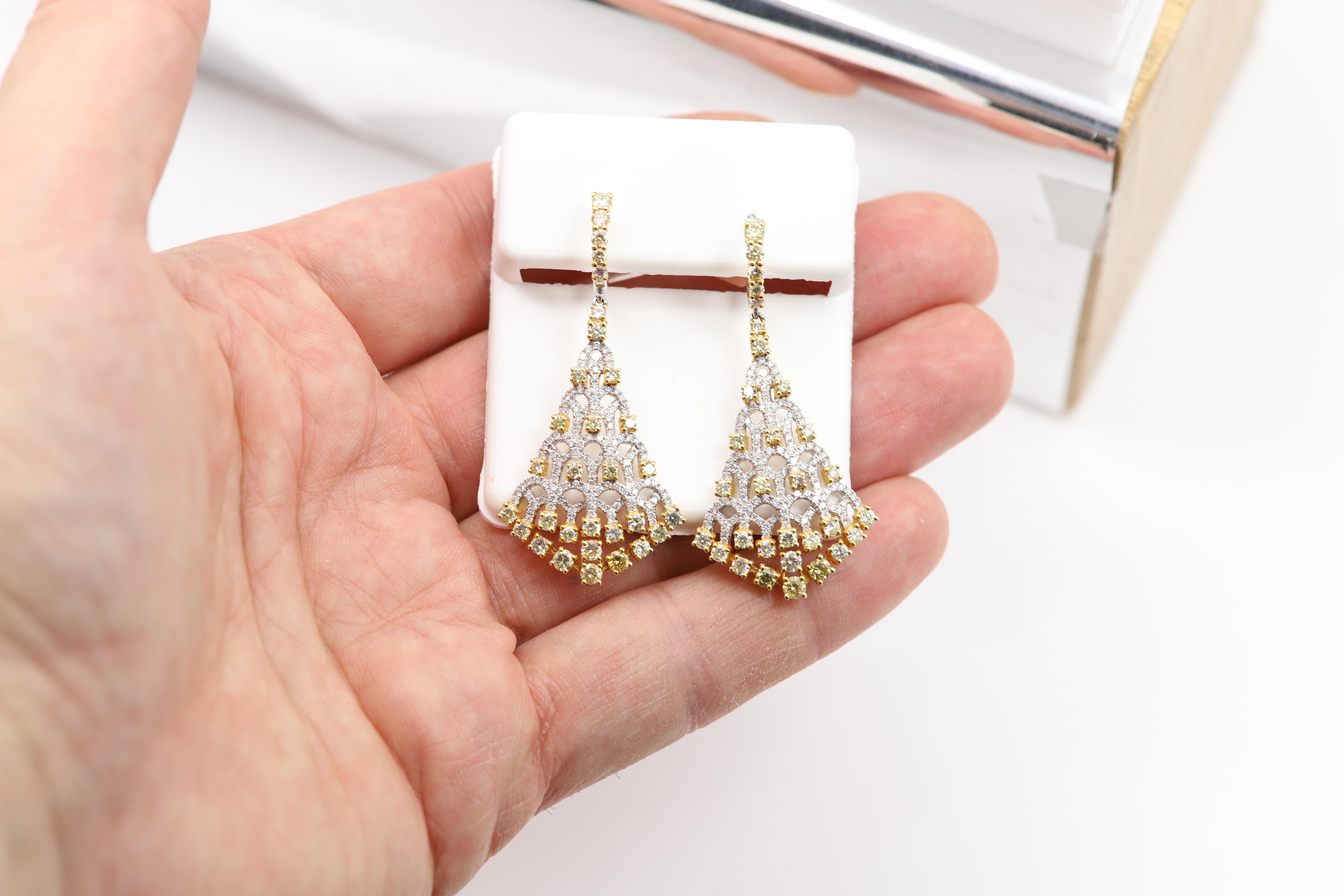 Elegant Yellow Diamonds Chandelier Earrings
Dangling Brilliant Diamonds 

Light Yellow, Yellow-ish, Green-ish and White Diamonds - all natural diamonds
18k White and Yellow gold- Two tone.
Total Gold weight  12.3 grams

Total White Diamonds 1.04