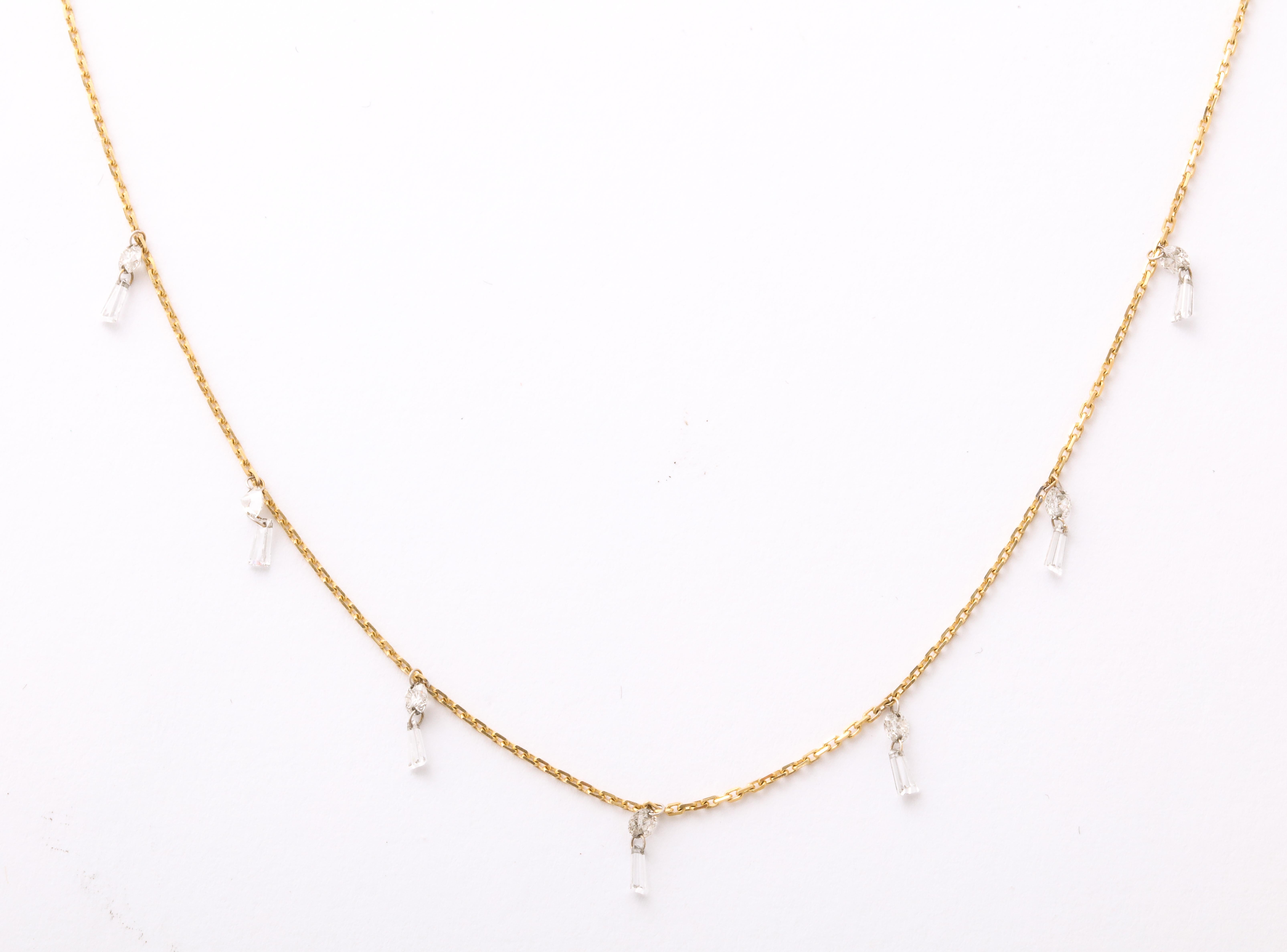 Modern Dangling Diamond Baguette Necklace 18 Karat Gold For Sale