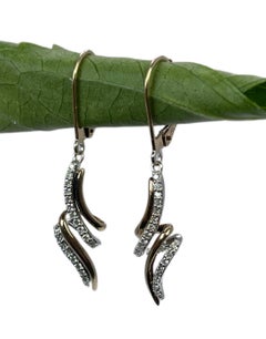 Dangling Diamond Earrings in 14KT yellow & white gold Leverback Twist Design