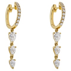 Boucles d'oreilles Huggie avec diamants et pendentifs