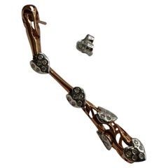 Dangling diamonds heart earrings 14KT gold