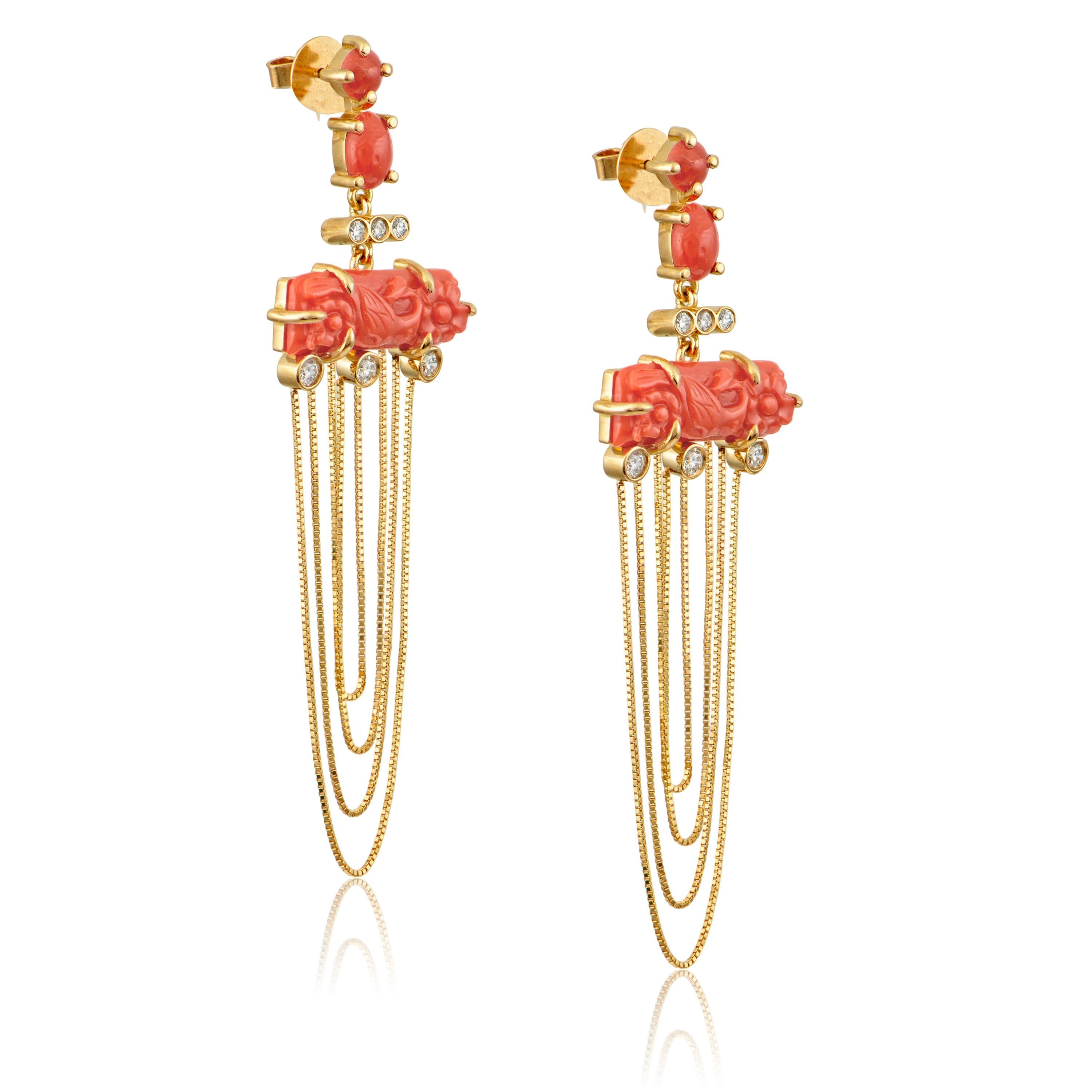 Designer: Alexia Gryllaki

Dangling Earrings

Barcode: ASR0003
Dimensions: L77x23mm
Weight: approximately 13.8g (pair)

Materials:
18 karat gold 
round brilliant-cut colorless diamonds approx. 0.57cts
carved corals approx. 9.78cts


Prices might