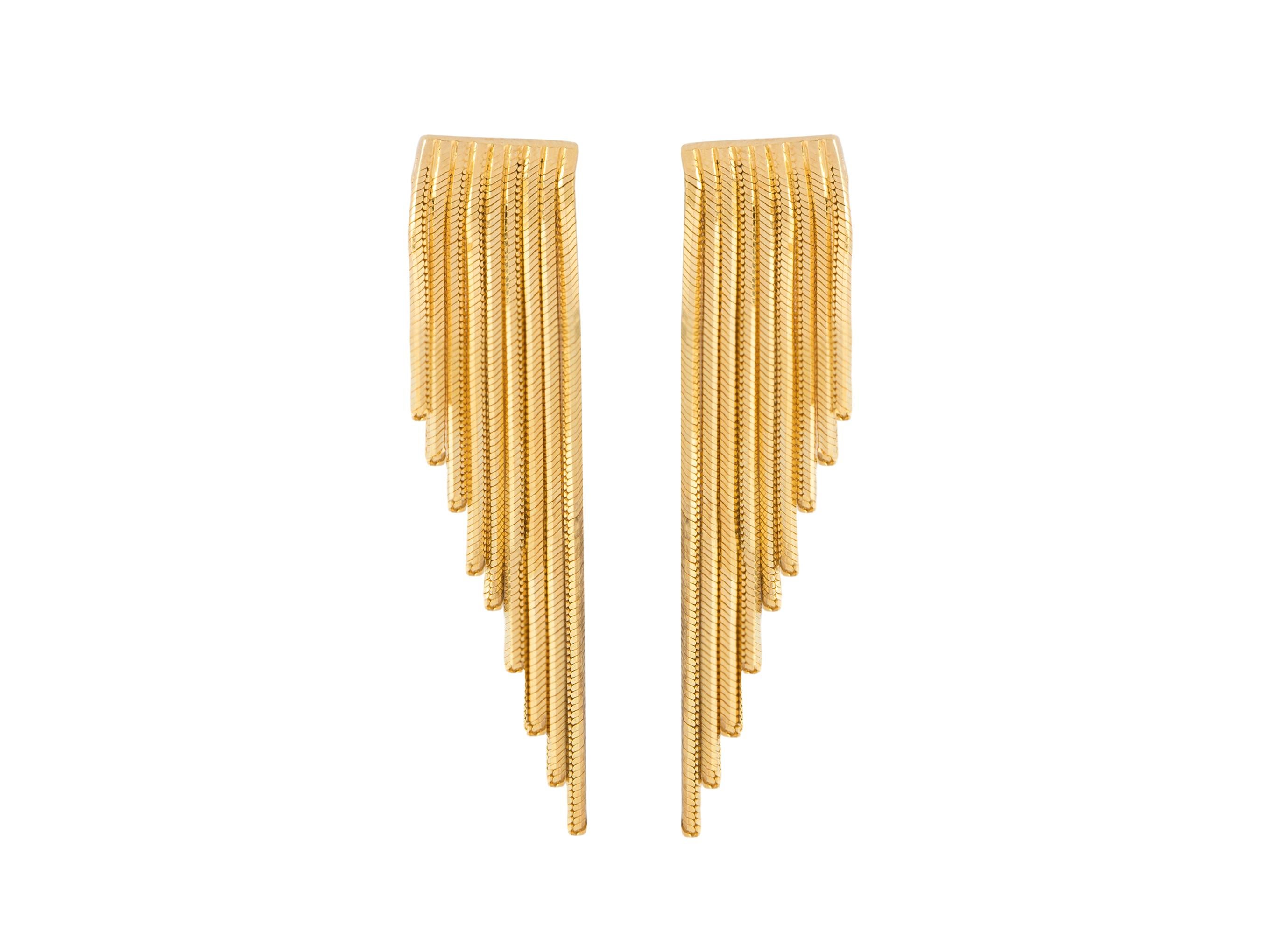 Classic shapes are updated with the inspiration of wings with this pair of earrings from Iosselliani. Specularly designed, the fringed pair is crafted with a cascade of 18 karat gold chains to lend swinging glamour to your daliy wear. Butterfly post