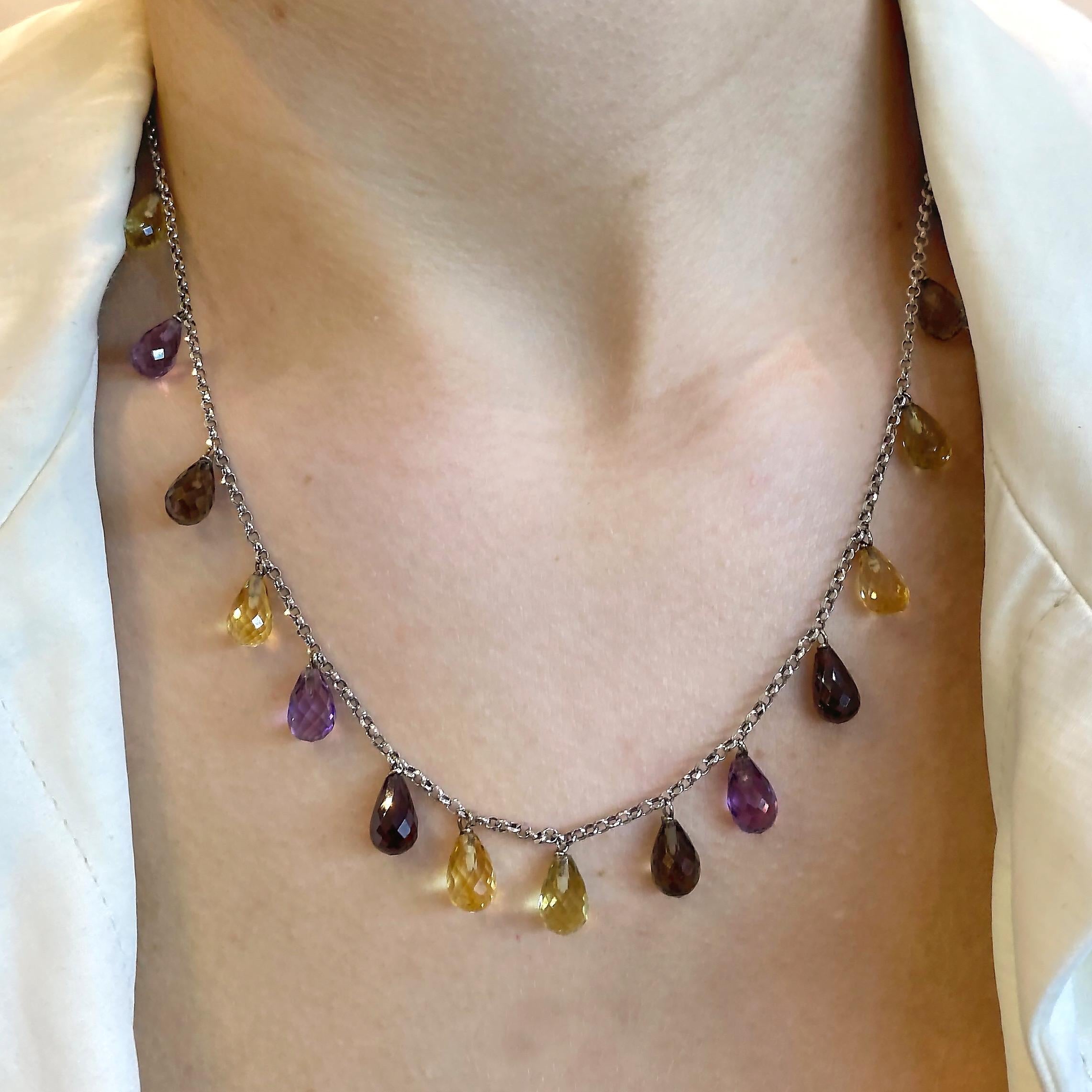 Designed to be your daily necklace that will bring light into any of your day to night looks. The combination of these colorful briolette cut gemstones on a dainty 18K gold chain, makes it the perfect effortless daily necklace to wear with