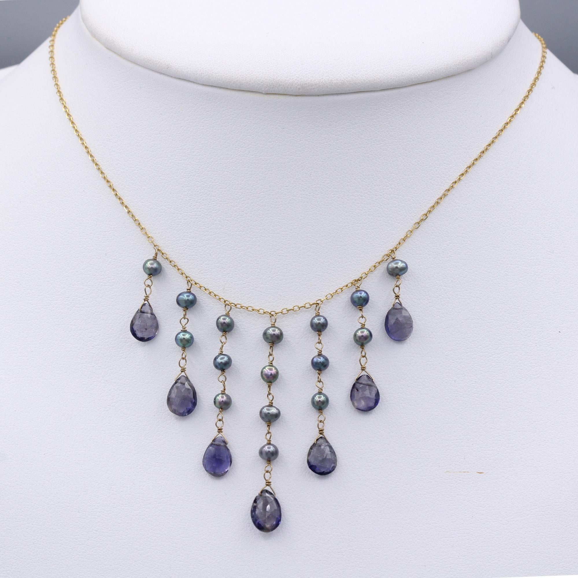 Elegant Dangling Pearls and Amethyst Necklace
14k Yellow Gold
Length 16’ Inch
Natural Amethyst blue-ish tone color approx. 8.0  mm drops
Fresh Water Grey Pearl approx. 3.0 mm
Dangle Length approx. 1.5’ Inch
Spring ring lock
Total weight 4.30 grams
