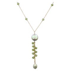 Dangling Peridot Necklace 14 Karat Yellow Gold Bead Wire Green Stones