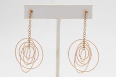 Dangling Rose Gold Circle Earrings