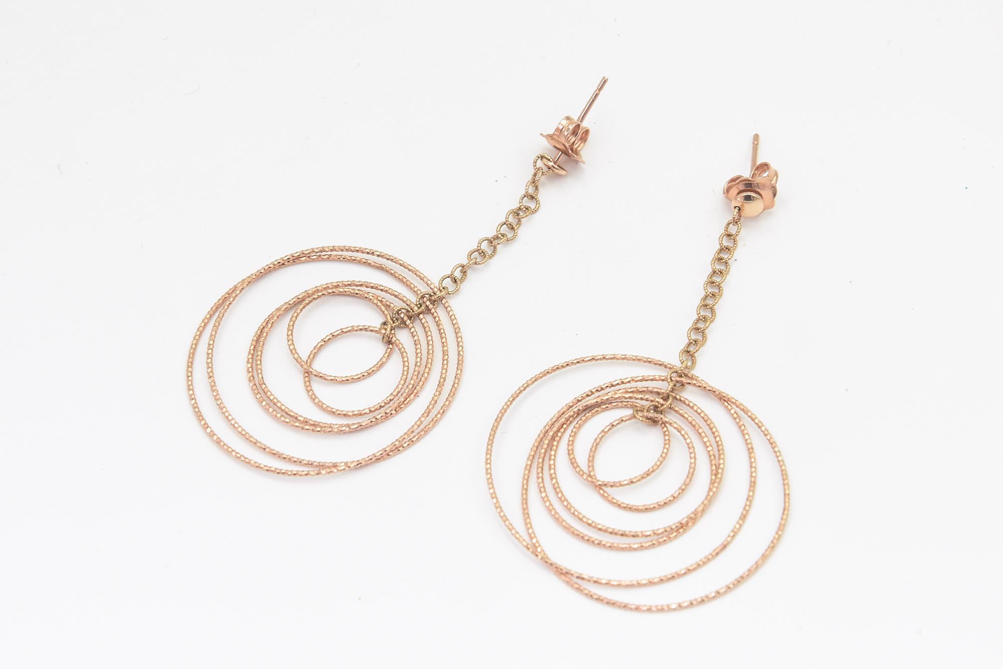 Dangling Rose Gold Circle Earrings For Sale 1