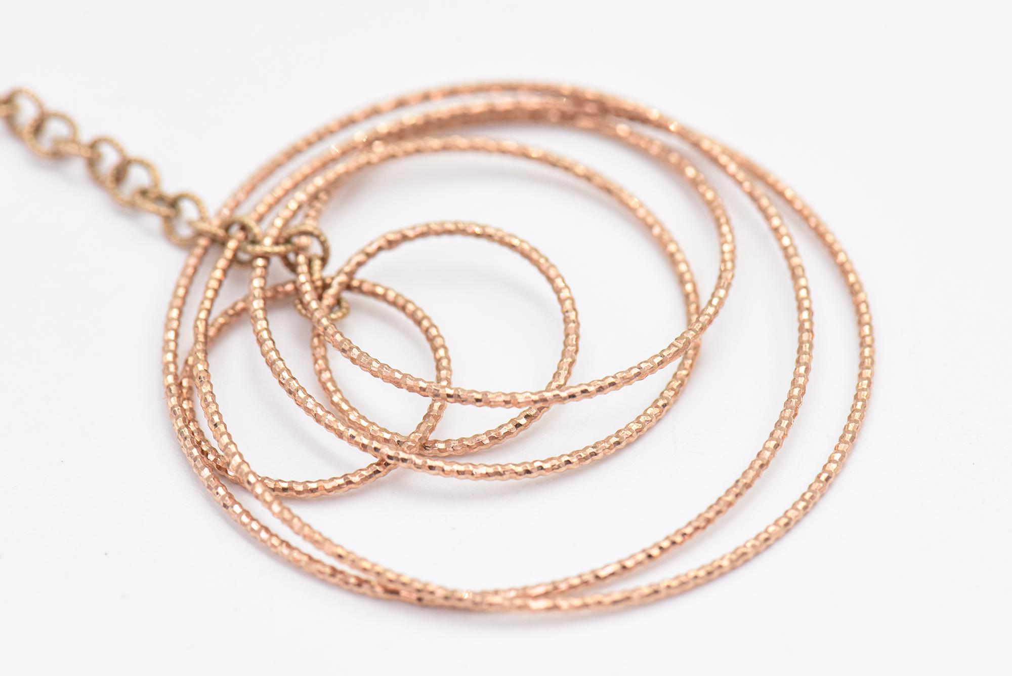 Dangling Rose Gold Circle Earrings For Sale 4
