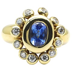 Dangling Sundrops Ring in 18 Karat Yellow Gold with a Tanzanite and Diamonds