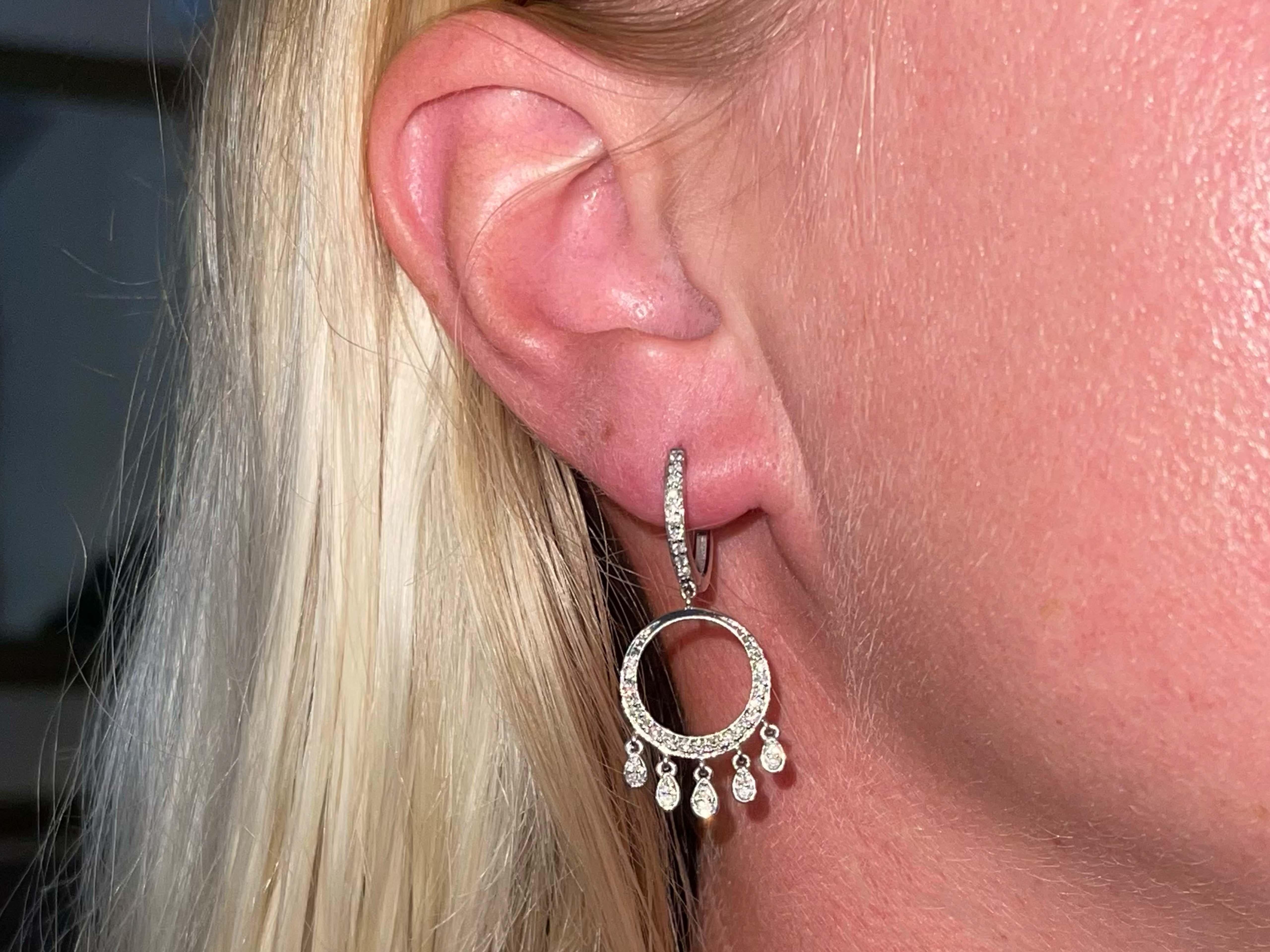 Earrings Specifications:

Metal: 18K White Gold

Total Weight: 5.4 Grams

Earring Diameter: 1.25