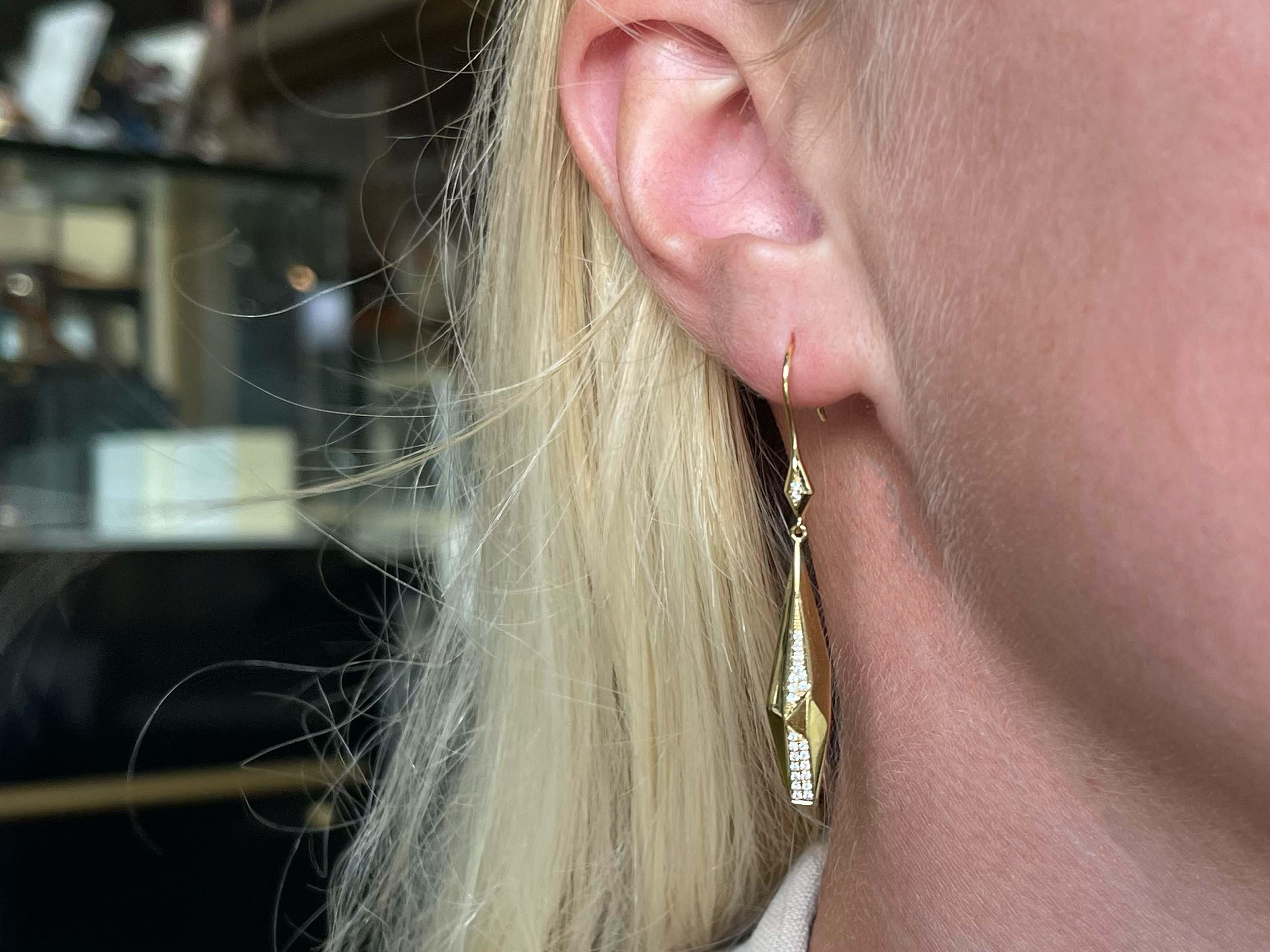 Earrings Specifications:

Metal: 18k Yellow Gold

Earring Length: 2