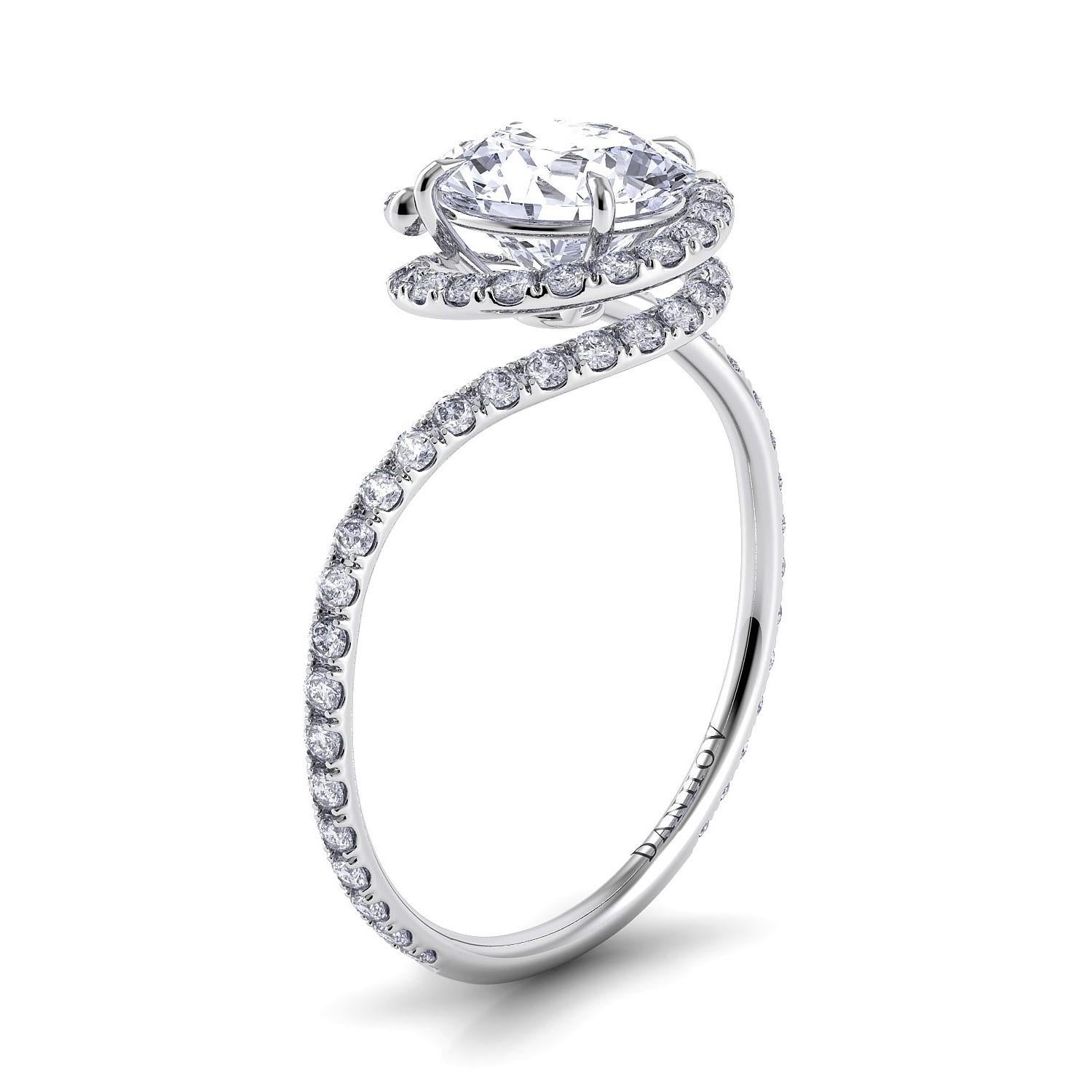 Abbraccio handmade engagement rings by Danhov 

Uniquely handmade, these designer engagement rings are the essence of true love’s perfect embrace featuring our iconic swirl holding the center diamond. Beginning with a single wire, it creates a band