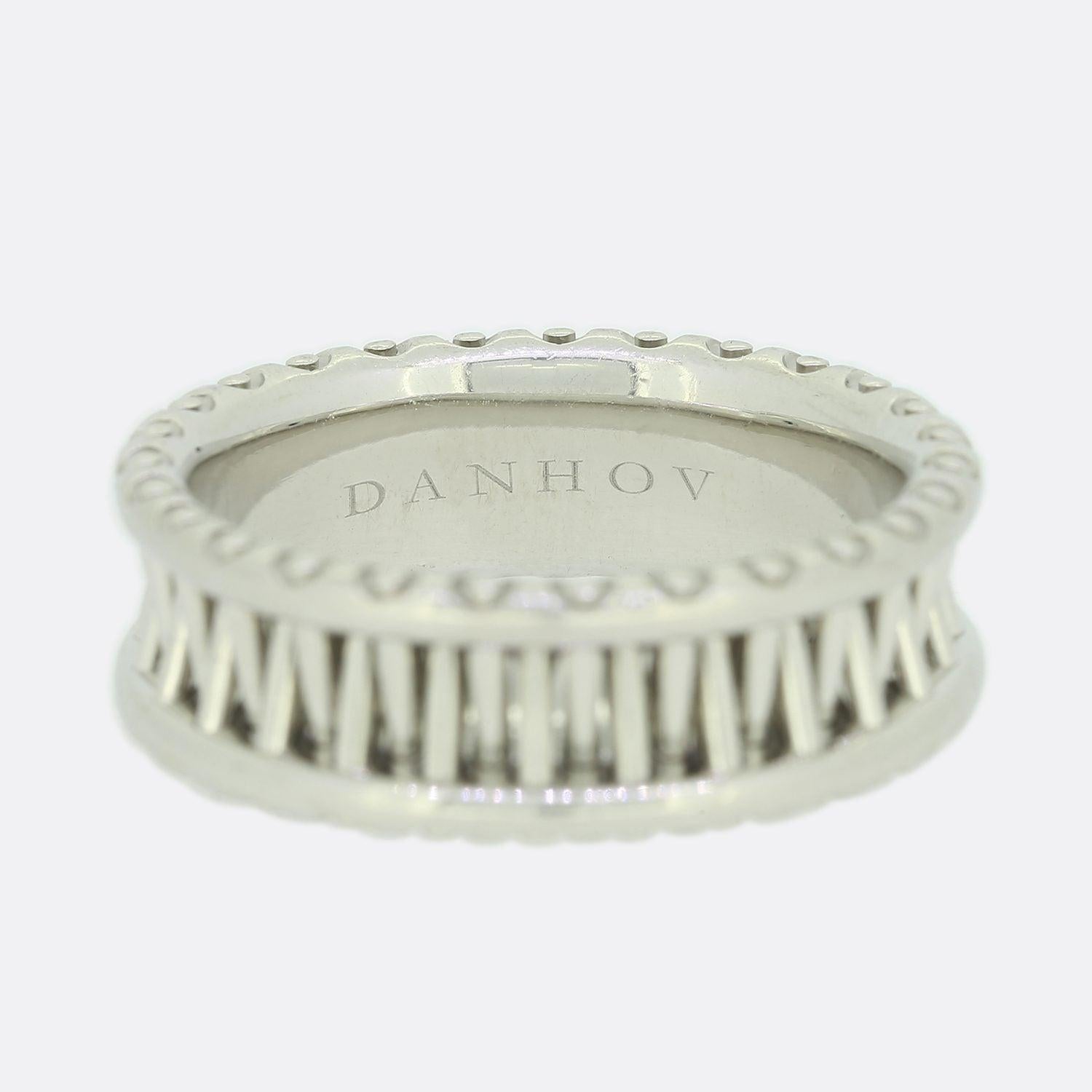 This is a gents Danhov Tubetto platinum wedding band ring. The design of this masculine and unique wedding band is inspired by the brides engagement ring and symbolises the endless love of his wedding promise.

Condition: Used (Very Good)
Weight: