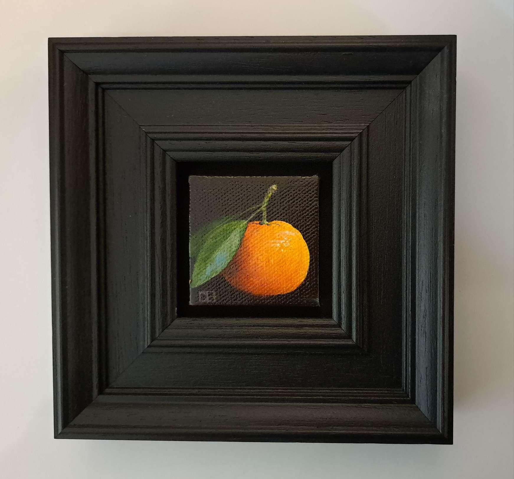 PocketBright Clementine is an original oil painting by Dani Humberstone as part of her Pocket Painting series featuring small scale oil realistic oil paintings with a nod to baroque still life. The paintings are set in a black wood layered
