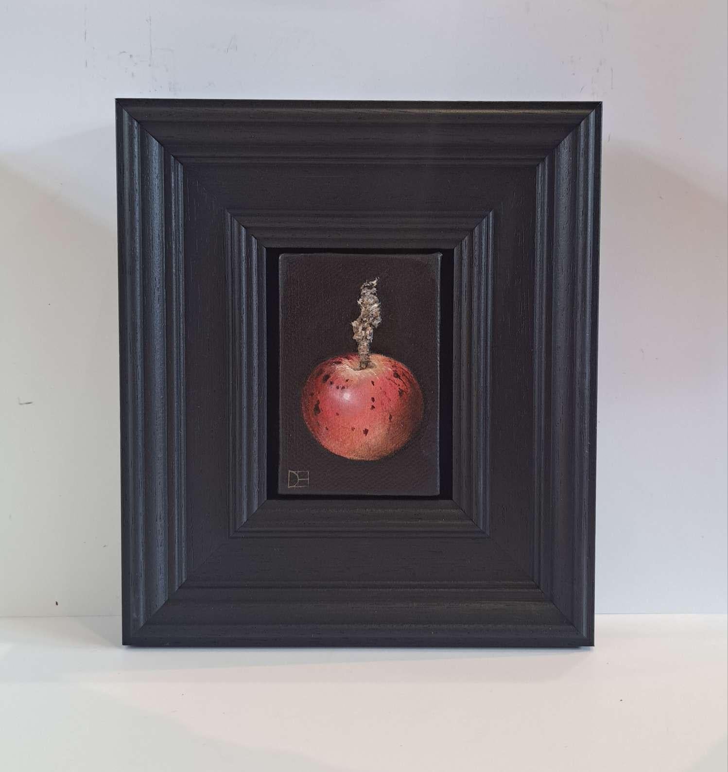 Pocket Wild Red Apple è un dipinto a olio originale di Dani Humberstone che fa parte della sua serie di dipinti Pocket, che presenta dipinti a olio realistici in scala ridotta, con un accenno alla pittura barocca di nature morte. I dipinti sono