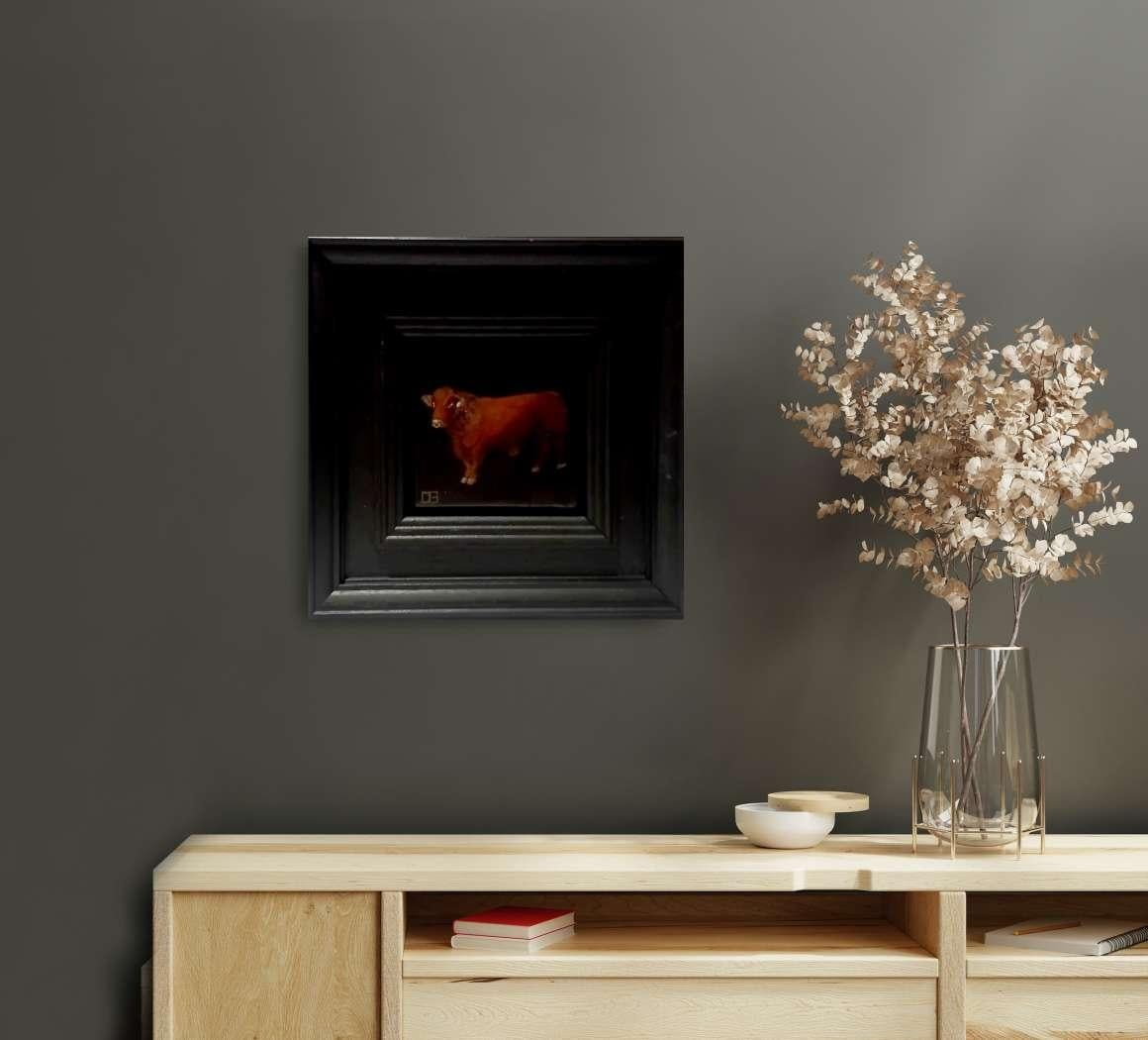 Pocket Bull is an original oil painting by Dani Humberstone as part of her Pocket Painting series featuring small scale realistic oil paintings, with a nod to baroque still life painting. The paintings are set in a black wood layered