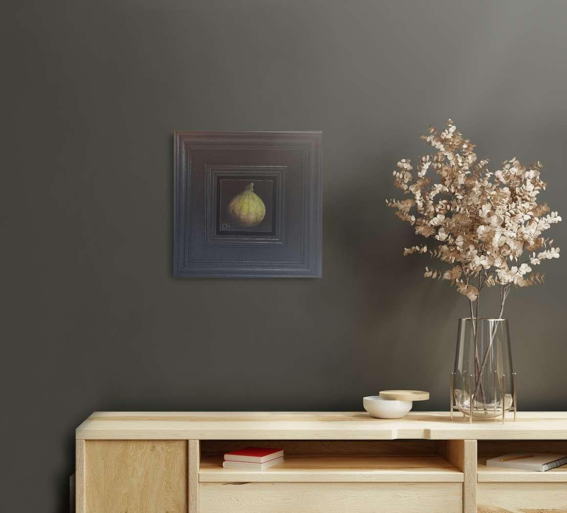 Pocket Green Fig 3c is an original oil painting by Dani Humberstone as part of her Pocket painting series featuring small scale realistic oil paintings, with a nod to baroque still life painting. The paintings are set in a black wood layered