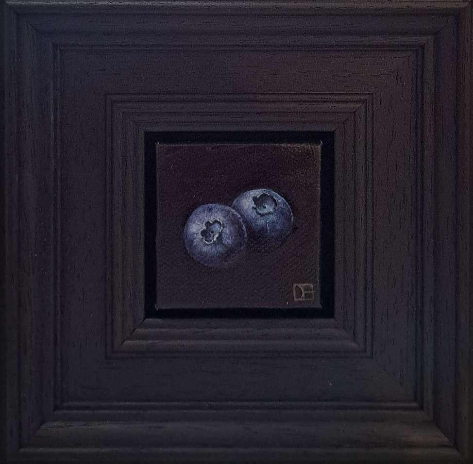 Arándanos de bolsillo nº 2 es un óleo original de Dani Humberstone que forma parte de su serie Pocket Painting (Pinturas de bolsillo), que presenta óleos realistas a pequeña escala, con un guiño a la pintura barroca de bodegones. Los cuadros están