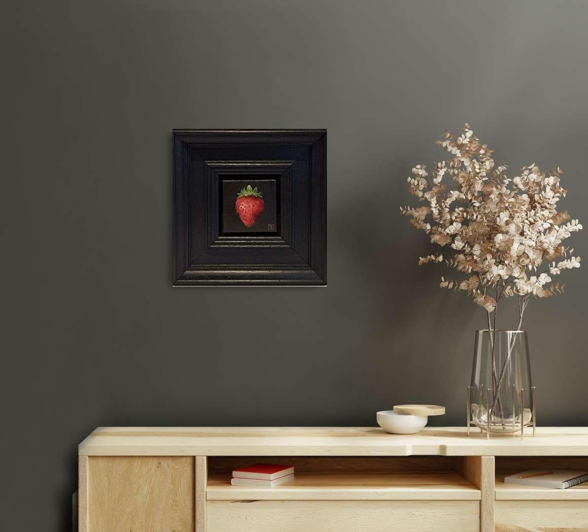Pocket Crimson Strawberry 2 c is an original oil painting by Dani Humberstone as part of her Pocket Painting series featuring small scale realistic oil paintings, with a nod to baroque still life painting. The paintings are set in a black wood