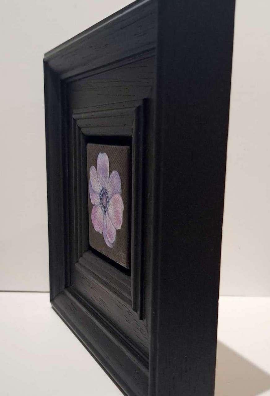 Pocket Anemone is an original oil painting by Dani Humberstone as part of her Pocket Painting series featuring small scale realistic oil paintings, with a nod to baroque still life painting. The paintings are set in a black wood layered
