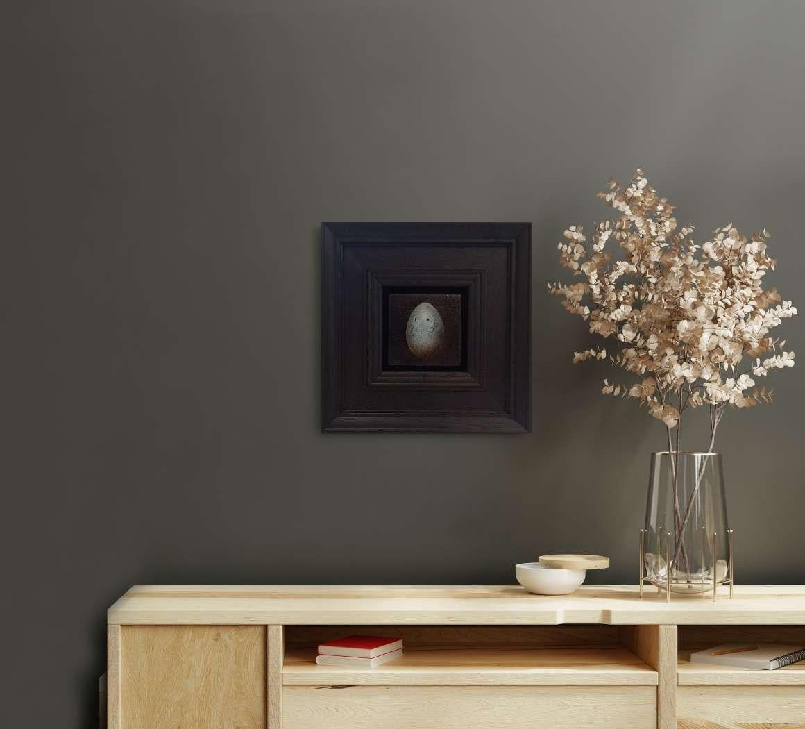 Pocket Pale Blue Blackbird Egg 2 c is an original oil painting by Dani Humberstone as part of her Pocket Painting series featuring small scale realistic oil paintings, with a nod to baroque still life painting. The paintings are set in a black wood
