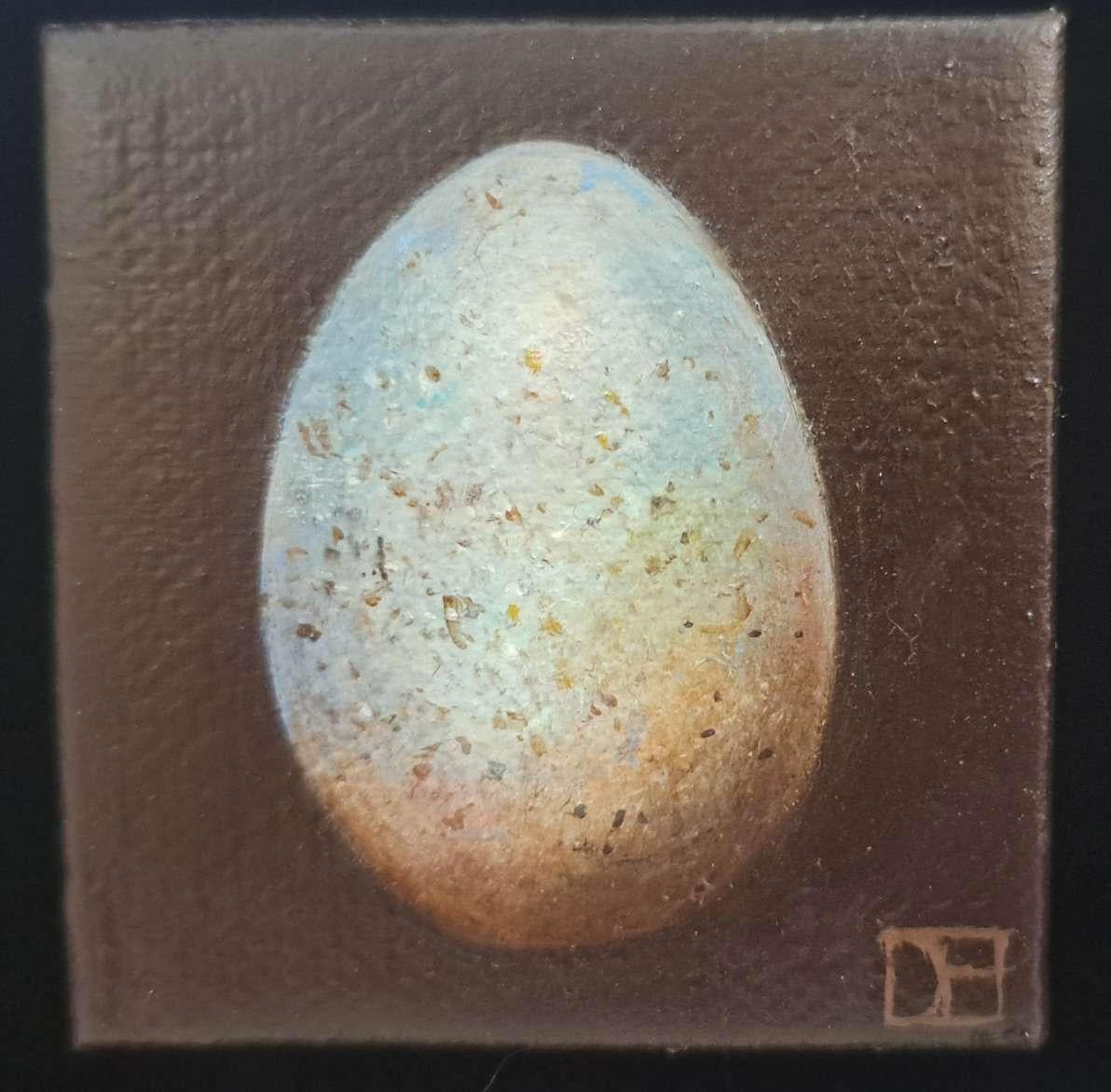 Pocket Pale Blue Blackbird's Egg 2 c è un dipinto a olio originale di Dani Humberstone che fa parte della sua serie Pocket Painting, caratterizzata da dipinti a olio realistici in piccola scala, con un accenno alla pittura barocca di nature morte. I