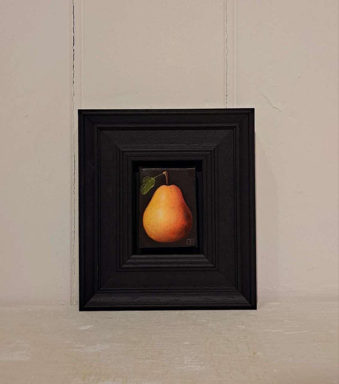 Pocket Pink Blush Pear is an original oil painting by Dani Humberstone as part of her Pocket Painting series featuring small scale realistic oil paintings, with a nod to baroque still life painting. The paintings are set in a black wood layered