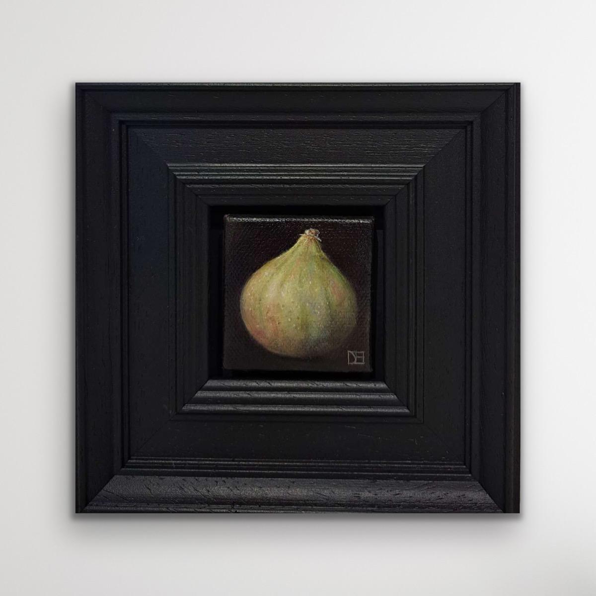 Pocket Round Green Fig is an original oil painting by Dani Humberstone as part of her Pocket Painting series featuring small scale realistic oil paintings, with a nod to baroque still life painting. The paitings are set in a black wood layered