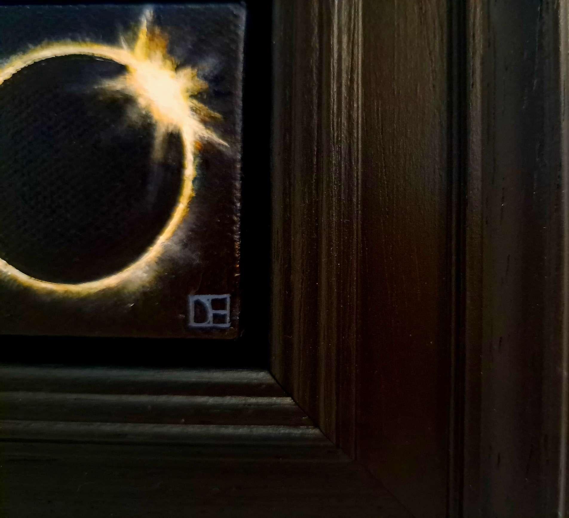 Pocket Sun Eclipse 2024 3 is an original oil painting by Dani Humberstone as part of her Pocket Painting series featuring small scale realistic oil paintings, with a nod to baroque still life painting. The paintings are set in a black wood layered