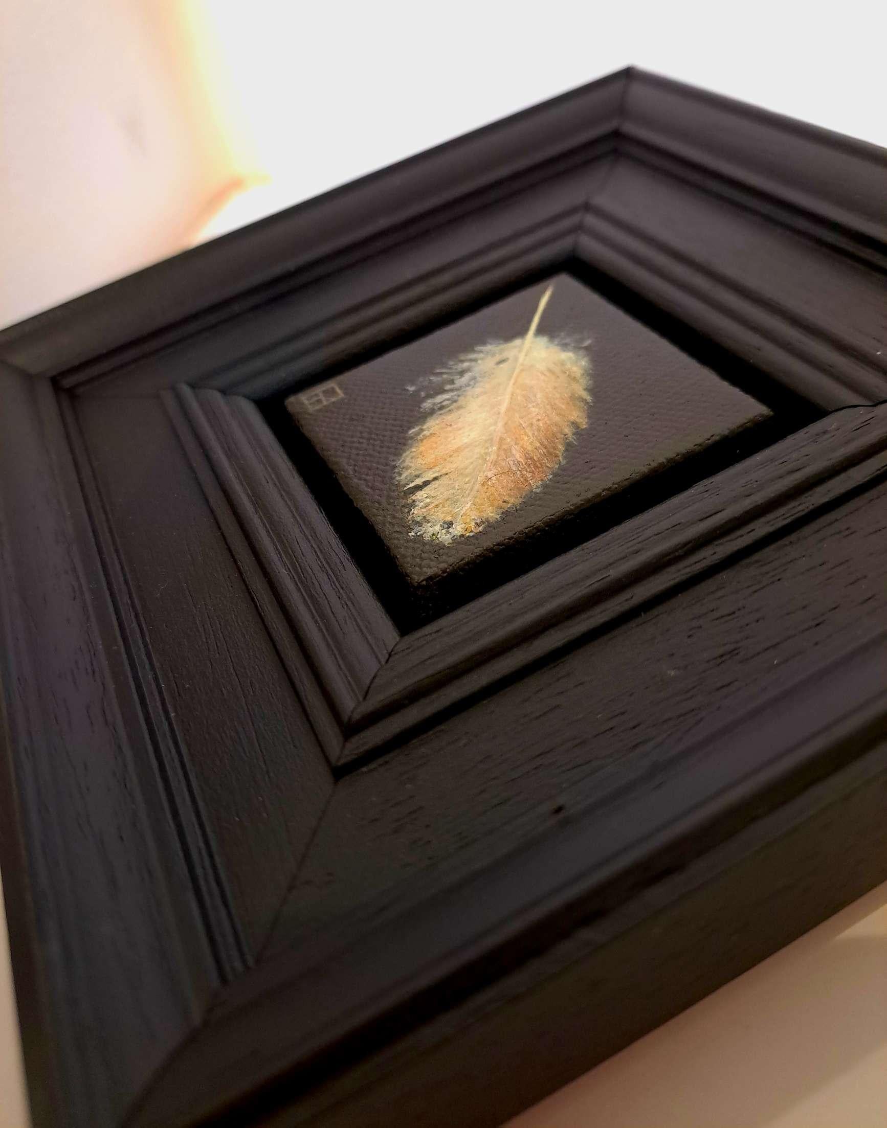 Spring Collection: Tawny Owl Feather is an original oil painting by Dani Humberstone as part of her Pocket Painting series featuring small scale realistic oil paintings, with a nod to baroque still life painting. The paintings are set in a black